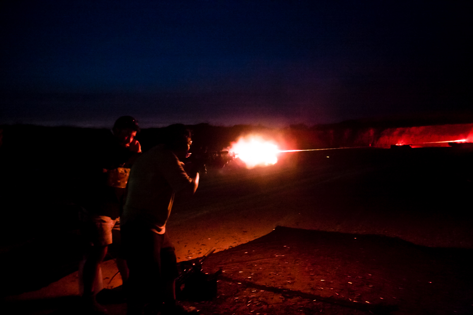 Near the end of the first day of Silencer Shoot '11, fire and the rat-tat-tat of a machine gun disturb the normally quiet proceedings as a suppressor unexpectadly ruptures.